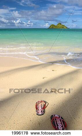 Hawaii, Oahu, Sandals (Slippers) On Lanikai Beach, Mokulua Islands View Large Photo Image Stock Photo - Hawaii, Oahu, Sandals (Slippers) On Lanikai Beach, Mokulua Islands. Fotosearch