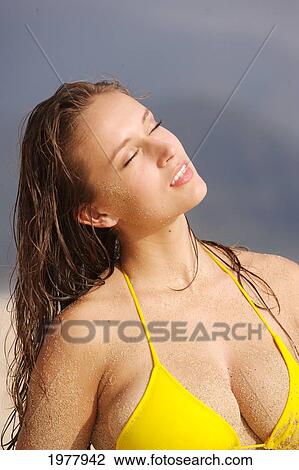Stock Image - Hawaii, Oahu, Sexy Girl On The Beach, Sandy.. Fotosearch