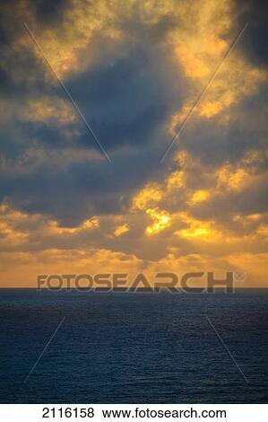 Hawaii, Oahu, Sunset over the ocean. View Large Photo Image Stock Photo - Hawaii, Oahu, Sunset over the ocean.. Fotosearch