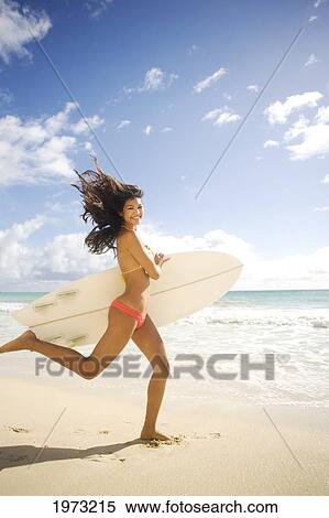 Hawaii, Oahu, Surfer Girl Enjoying A Day Out. View Large Photo Image Stock Photography - Hawaii, Oahu, Surfer Girl Enjoying A Day Out.. Fotosearch