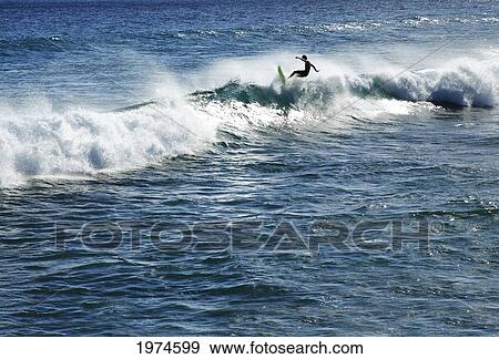 Stock Photo - Hawaii, Oahu, Surfer Riding A Wave.. Fotosearch
