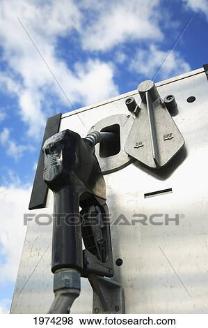 Stock Photo - Hawaii, Oahu, Unleaded Gas Pump With A Blue Sky In The Background.. Fotosearch