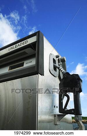 Hawaii, Oahu, Unleaded Gas Pump With A Blue Sky In The Background. View Large Photo Image Stock Photo - Hawaii, Oahu, Unleaded Gas Pump With A Blue Sky In The Background.. Fotosearch