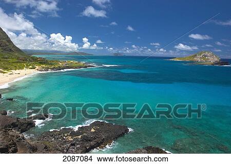 Hawaii, Oahu, View from Makapu'u, clear ocean water, rabbit island, dramatic sky View Large Photo Image Picture - Hawaii, Oahu, View from Makapu'u, clear ocean water, rabbit island, dramatic sky. Fotosearch