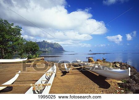 Stock Photography - Hawaii, Oahu, Waiahole, Outrigger Canoes On Beach, Turquoise Water. Fotosearch