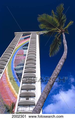 Hawaii, Oahu, Waikiki, Angled View Of Hilton Hawaiian Village, Palm Tree, Blue Sky View Large Photo Image Stock Image - Hawaii, Oahu, Waikiki, Angled View Of Hilton Hawaiian Village, Palm Tree, Blue Sky. Fotosearch