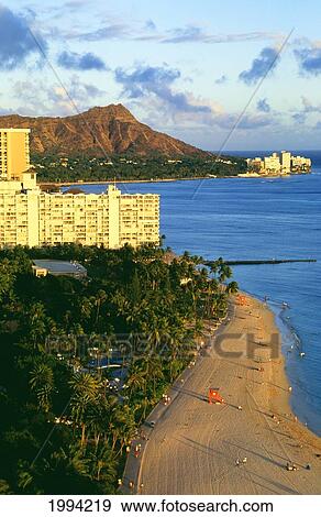 Hawaii, Oahu, Waikiki Beach And Diamond Head In The Late Afternoon. View Large Photo Image Stock Photo - Hawaii, Oahu, Waikiki Beach And Diamond Head In The Late Afternoon.. Fotosearch