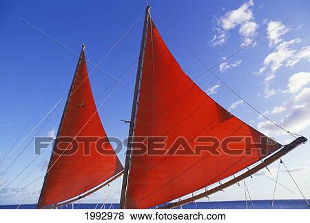 Stock Photo - Hawaii, Oahu, Waikiki, Bright Red Sails Of Aikane Catamaran.. Fotosearch