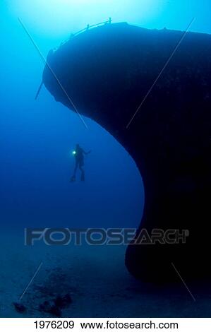 Stock Photo - Hawaii, Oahu, Waikiki, Diver Exploring Sea Tiger Ship Wreck.. Fotosearch