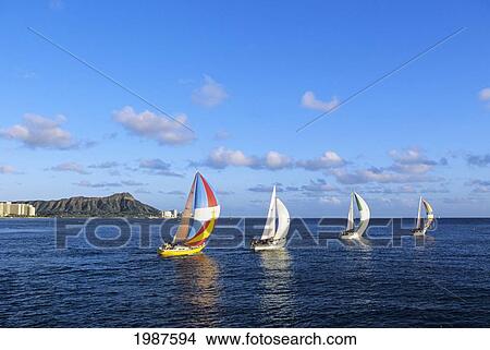 Picture - Hawaii, Oahu, Waikiki, Four Sailboats In A Line On Ocean, Diamond Head In Background.. Fotosearch