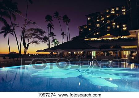 Picture - Hawaii, Oahu, Waikiki, Halekulani Hotel, Lit Pool At Twilight Exterior Architecture A49G. Fotosearch