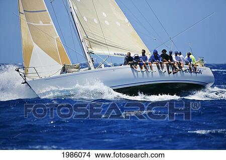 Hawaii, Oahu, Waikiki Offshore Series 2005, Sailboat On Blue Ocean. View Large Photo Image Picture - Hawaii, Oahu, Waikiki Offshore Series 2005, Sailboat On Blue Ocean.. Fotosearch