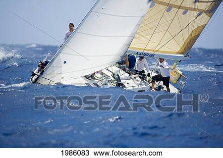 Hawaii, Oahu, Waikiki Offshore Series 2005, Sailboat On Blue Ocean. View Large Photo Image Stock Image - Hawaii, Oahu, Waikiki Offshore Series 2005, Sailboat On Blue Ocean.. Fotosearch