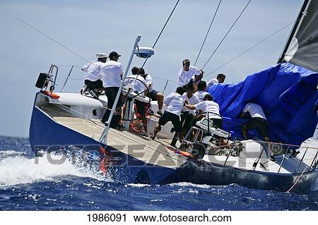 Hawaii, Oahu, Waikiki Offshore Series 2005, Sailboat On Blue Ocean. View Large Photo Image Stock Image - Hawaii, Oahu, Waikiki Offshore Series 2005, Sailboat On Blue Ocean.. Fotosearch