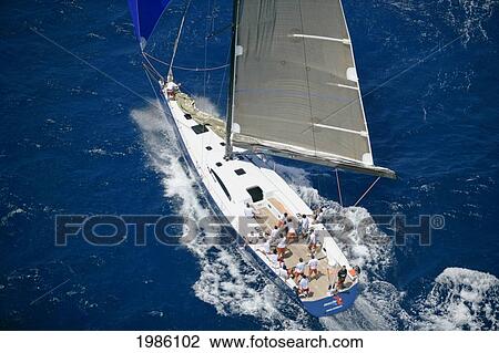 Hawaii, Oahu, Waikiki Offshore Series 2005, Sailboat On Blue Ocean. View Large Photo Image Stock Image - Hawaii, Oahu, Waikiki Offshore Series 2005, Sailboat On Blue Ocean.. Fotosearch