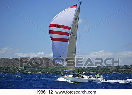 Hawaii, Oahu, Waikiki Offshore Series 2005, Sailboat On Blue Ocean, Land In Background. View Large Photo Image Stock Image - Hawaii, Oahu, Waikiki Offshore Series 2005, Sailboat On Blue Ocean, Land In Background.. Fotosearch