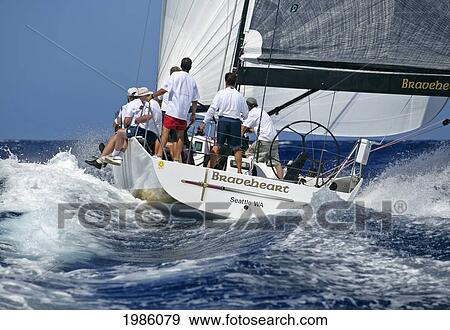 Hawaii, Oahu, Waikiki Offshore Series 2005, Sailboat On Blue Ocean. View Large Photo Image Stock Photo - Hawaii, Oahu, Waikiki Offshore Series 2005, Sailboat On Blue Ocean.. Fotosearch