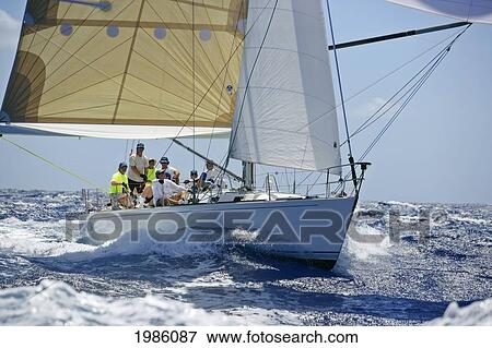 Hawaii, Oahu, Waikiki Offshore Series 2005, Sailboat On Blue Ocean. View Large Photo Image Stock Photo - Hawaii, Oahu, Waikiki Offshore Series 2005, Sailboat On Blue Ocean.. Fotosearch