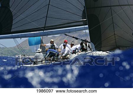 Hawaii, Oahu, Waikiki Offshore Series 2005, Sailboat On Blue Ocean. View Large Photo Image Stock Photo - Hawaii, Oahu, Waikiki Offshore Series 2005, Sailboat On Blue Ocean.. Fotosearch