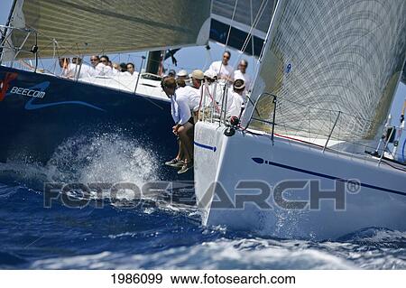 Hawaii, Oahu, Waikiki Offshore Series 2005, Sailboats On Blue Ocean. View Large Photo Image Stock Photo - Hawaii, Oahu, Waikiki Offshore Series 2005, Sailboats On Blue Ocean.. Fotosearch