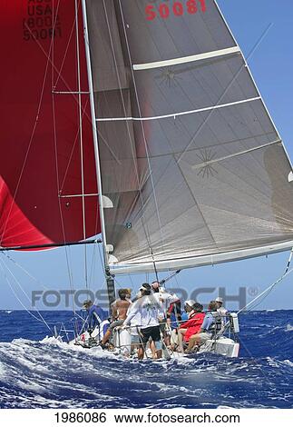 Hawaii, Oahu, Waikiki Offshore Series 2005, Sailboat On Blue Ocean. View Large Photo Image Stock Photograph - Hawaii, Oahu, Waikiki Offshore Series 2005, Sailboat On Blue Ocean.. Fotosearch