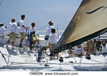 Stock Photograph - Hawaii, Oahu, Waikiki Offshore Series 2005, Sailboat On Blue Ocean.. Fotosearch
