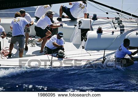 Hawaii, Oahu, Waikiki Offshore Series 2005, Sailboat On Blue Ocean. View Large Photo Image Stock Photography - Hawaii, Oahu, Waikiki Offshore Series 2005, Sailboat On Blue Ocean.. Fotosearch
