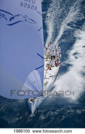 Hawaii, Oahu, Waikiki Offshore Series 2005, Sailboat On Blue Ocean. View Large Photo Image Stock Photography - Hawaii, Oahu, Waikiki Offshore Series 2005, Sailboat On Blue Ocean.. Fotosearch