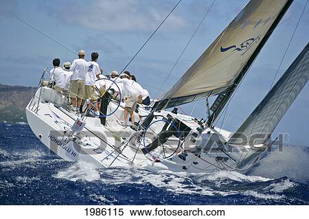 Stock Photography - Hawaii, Oahu, Waikiki Offshore Series 2005, Sailboat On Blue Ocean, Land In Background.. Fotosearch
