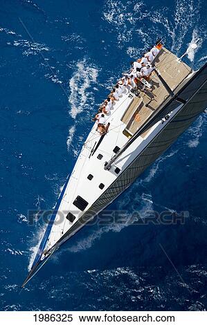 Stock Photography - Hawaii, Oahu, Waikiki Offshore Series 2005, Sailboat On Blue Ocean.. Fotosearch