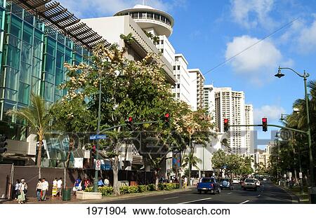 Hawaii, Oahu, Waikiki, View Of A Busy Intersection With Locals And Tourists Traveling About. View Large Photo Image Picture - Hawaii, Oahu, Waikiki, View Of A Busy Intersection With Locals And Tourists Traveling About.. Fotosearch