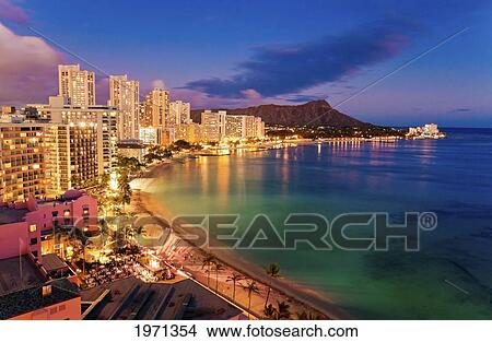 Picture - Hawaii, Oahu, Waikiki, View Of Hotels Along Ocean And Diamond Head In The Evening.. Fotosearch