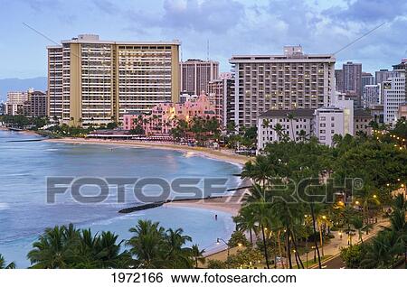 Stock Photograph - Hawaii, Oahu, Waikiki, View Of Waikiki Hotels And Beach At Sunrise.. Fotosearch