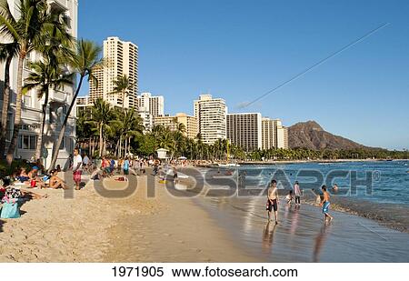Stock Photography - Hawaii, Oahu, Waikiki, Waikiki Beach During Midday Full Of Visitors.. Fotosearch