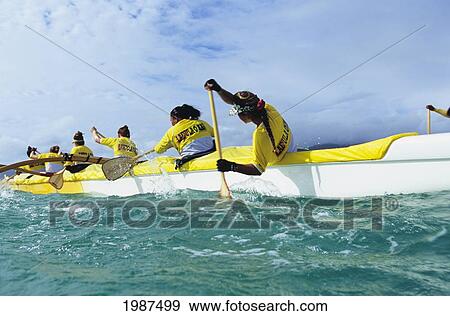 Hawaii, Oahu, Waimanalo Bay, Women's Paddling Team In Dad Center Race For Women. No Model Release View Large Photo Image Stock Photo - Hawaii, Oahu, Waimanalo Bay, Women's Paddling Team In Dad Center Race For Women. No Model Release. Fotosearch