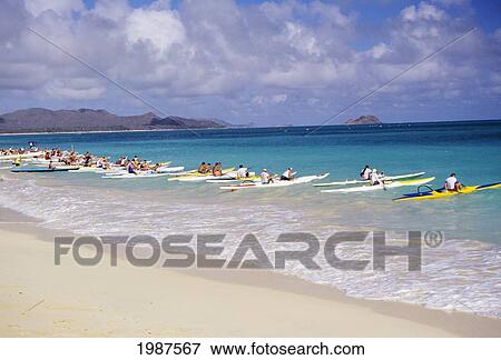 Hawaii, Oahu, Waimanalo, Paddlers Line Up One-Man Canoes Just Offshore For The Start Of A Race. No Model Release View Large Photo Image Stock Photo - Hawaii, Oahu, Waimanalo, Paddlers Line Up One-Man Canoes Just Offshore For The Start Of A Race. No Model Release. Fotosearch