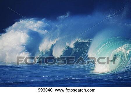 Stock Image - Hawaii, Oahu, Waimea Bay; Turquoise Waves Curling Crashing With Clouds Of White Wash. Fotosearch