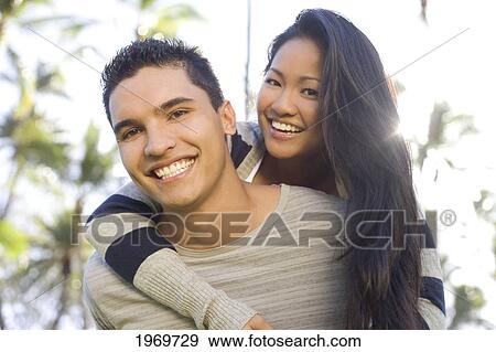 Hawaii, Oahu, Young Couple Enjoying A Day Outdoors. View Large Photo Image Stock Photo - Hawaii, Oahu, Young Couple Enjoying A Day Outdoors.. Fotosearch