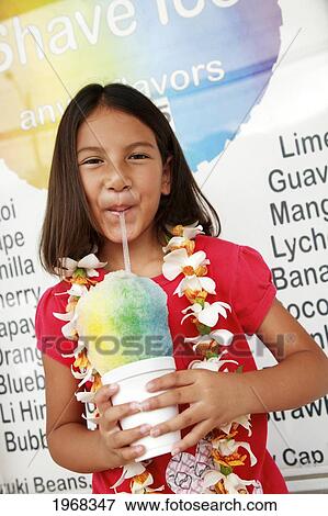 Hawaii, Oahu, Young Girl Drinking From A Shave Ice. View Large Photo Image Stock Photo - Hawaii, Oahu, Young Girl Drinking From A Shave Ice.. Fotosearch