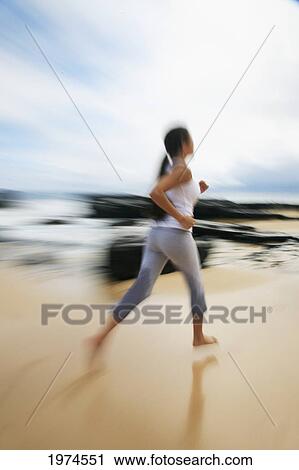 Hawaii, Oahu, Young Girl On The Beach Running In The Sand. View Large Photo Image Stock Image - Hawaii, Oahu, Young Girl On The Beach Running In The Sand.. Fotosearch