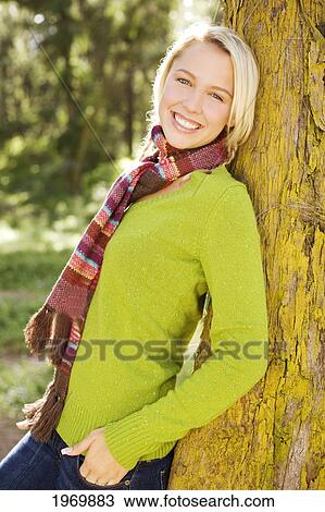Stock Image - Hawaii, Oahu, Young Woman Dressed In Warm Winter Clothes.. Fotosearch