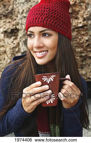 Hawaii, Oahu, Young Woman Outside In Cozy Winter Weather Drinking Coffee. View Large Photo Image Stock Photograph - Hawaii, Oahu, Young Woman Outside In Cozy Winter Weather Drinking Coffee.. Fotosearch