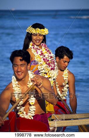 Hawaii, Polynesian Canoe Paddlers: 2 Men And 1 Woman Both Wearing Leis View Large Photo Image Stock Photo - Hawaii, Polynesian Canoe Paddlers: 2 Men And 1 Woman Both Wearing Leis. Fotosearch