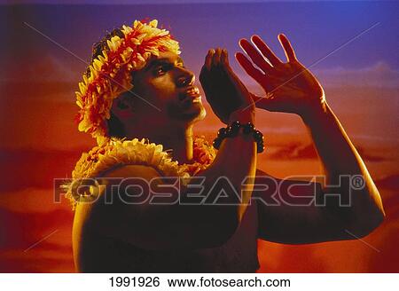 Hawaii, Polynesian Man At Sunset, Wearing Leis, Hands Raised. View Large Photo Image Stock Photograph - Hawaii, Polynesian Man At Sunset, Wearing Leis, Hands Raised.. Fotosearch