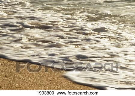 Hawaii, Ripple Of Water And Seafoam Breaks On Sandy Shore. View Large Photo Image Stock Image - Hawaii, Ripple Of Water And Seafoam Breaks On Sandy Shore.. Fotosearch