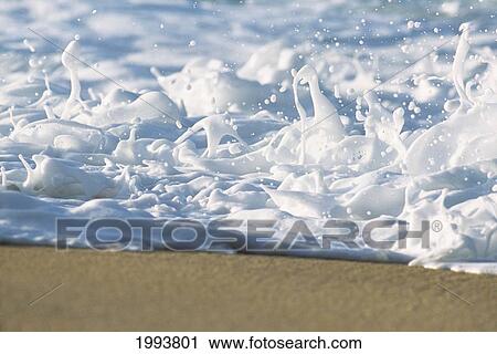 Hawaii, Ripple Of Water And Seafoam Breaks On Sandy Shore. View Large Photo Image Stock Image - Hawaii, Ripple Of Water And Seafoam Breaks On Sandy Shore.. Fotosearch