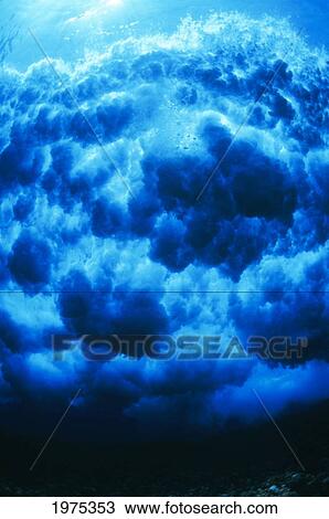 Stock Image - Hawaii, Underwater View Of Wave Breaking Over Reef, View From Below.. Fotosearch