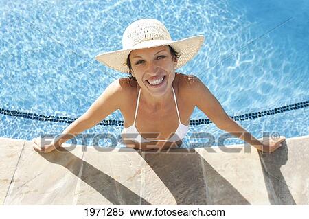 Stock Photography - Hawaii, Woman Enjoying A Day At The Pool.. Fotosearch