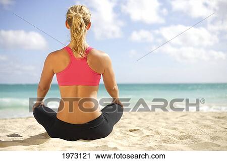 Hawaii, Woman Sitting On Beach In Remote Tropical Location. View Large Photo Image Stock Image - Hawaii, Woman Sitting On Beach In Remote Tropical Location.. Fotosearch