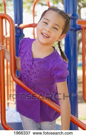 Stock Photo - Hawaii, Young Girl Enjoying A Day At The Park.. Fotosearch